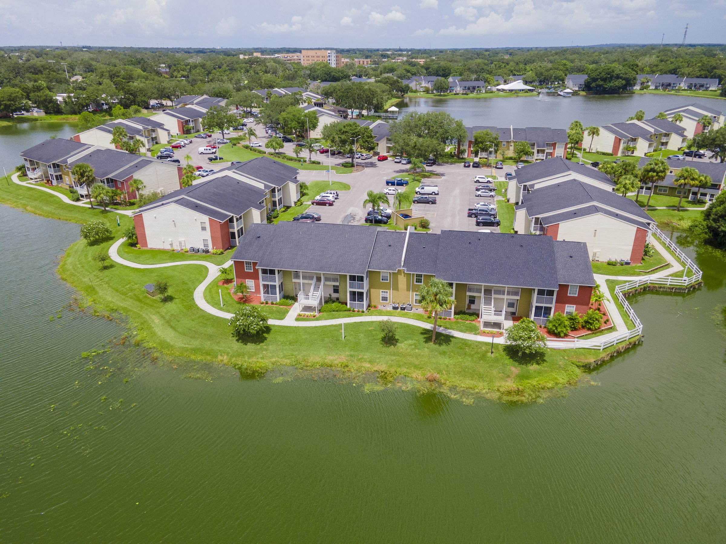 Aerial view of a Condominium community on a lake